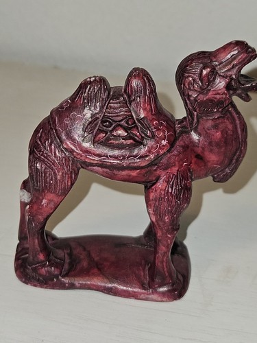 Carved camel unknown - carved,